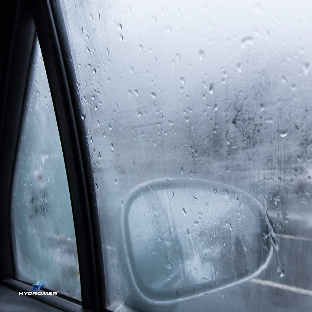 Hydromer&trade;&nbsp;Luxere&reg; anti-fog and condensation control coatings. Car window with fog and condensation.
